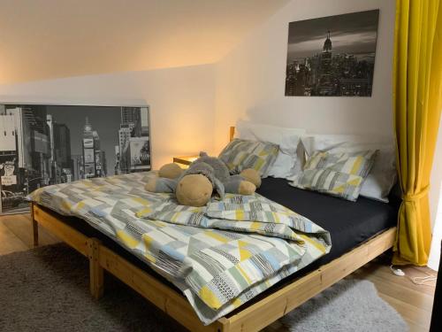 
Postel nebo postele na pokoji v ubytování Apartmány Tylovice
