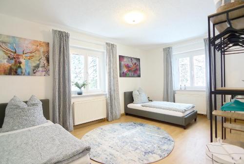 Un pat sau paturi într-o cameră la Haus Donnerberg Rehefeld