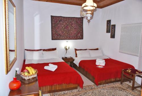 A bed or beds in a room at Traditional Guesthouse Alkistis