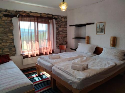 A bed or beds in a room at Casa Lambuh
