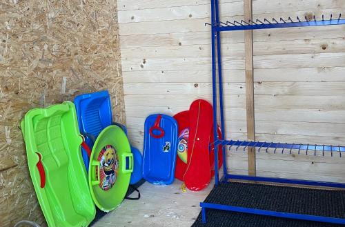 a room with three surfboards sitting next to a wall at Apartmány MAX in Vaclavov u Bruntalu