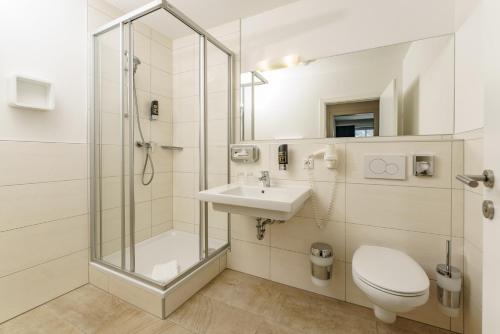 Bilik mandi di Appartements Landhaus Hubertus Wellness & Breakfast