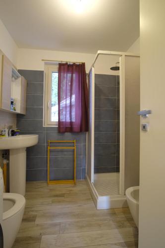 a bathroom with a shower and a sink at Sérémont 534 - CIR 0049 in Charvensod