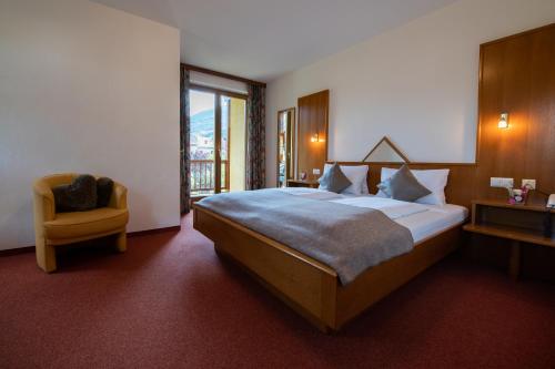 Кровать или кровати в номере Hotel Restaurant Platzer