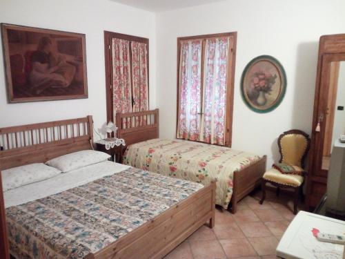 Ένα ή περισσότερα κρεβάτια σε δωμάτιο στο Bed & Breakfast Il Giardino