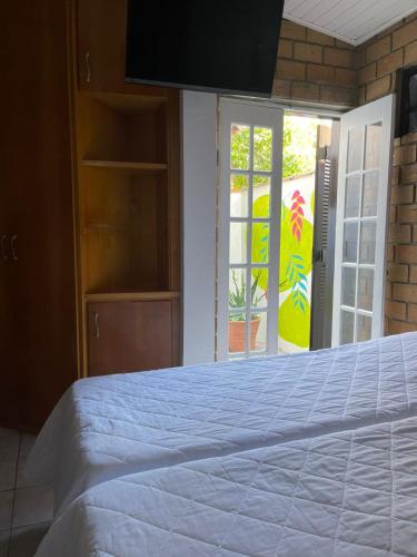 Barequeçaba Praia Hotelにあるベッド