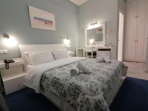 Postel nebo postele na pokoji v ubytování Hotel Galaxidi