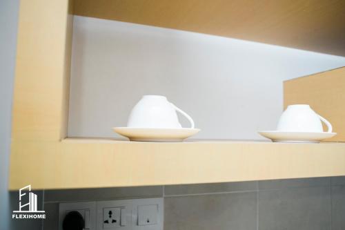 two bowls sitting on top of a kitchen counter at 10am-6pm, SAME DAY CHECK IN AND CHECK OUT, Work From Home, Shaftsbury-Cyberjaya, Comfy Home by Flexihome-MY in Cyberjaya