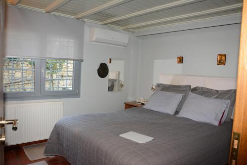 מיטה או מיטות בחדר ב-Kalavrita Mountain Resort