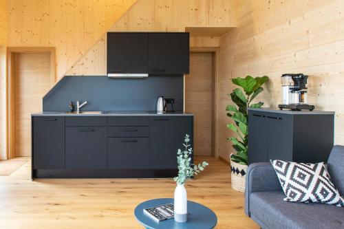 Kuchyň nebo kuchyňský kout v ubytování Masura Cabins