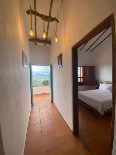 Ein Bett oder Betten in einem Zimmer der Unterkunft Glamping Valley Barichara