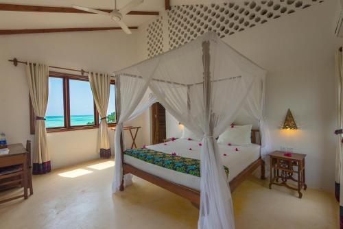 Katil atau katil-katil dalam bilik di Warere Beach