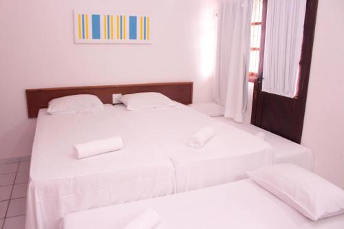 Ліжко або ліжка в номері Casa Duplex 3 Suítes em Condomínio