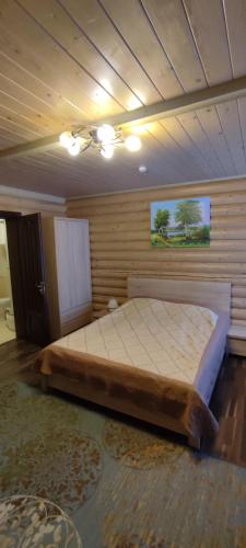 Postel nebo postele na pokoji v ubytování Mini Hotel Zakrut