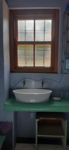 Bilik mandi di Gecko Cottage at Artemis