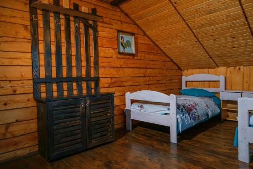 Postel nebo postele na pokoji v ubytování садиба Дерев*яна Хата