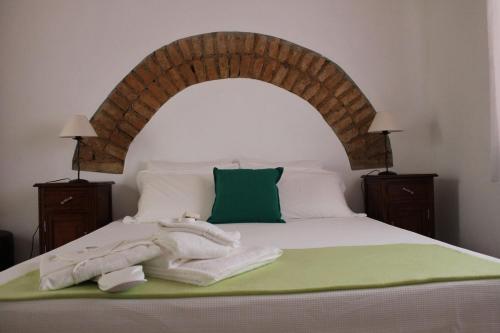 Ένα ή περισσότερα κρεβάτια σε δωμάτιο στο Casa da Estalagem - Turismo Rural