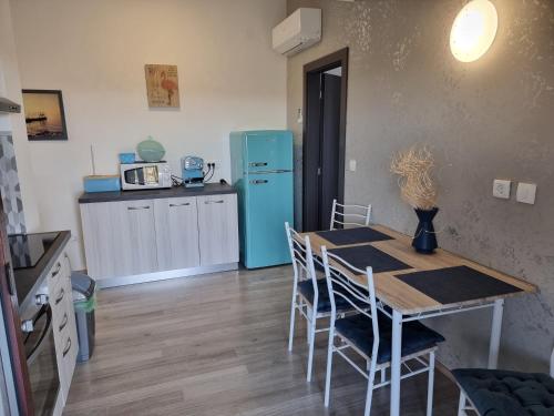 Kuchyň nebo kuchyňský kout v ubytování Apartment Pharos