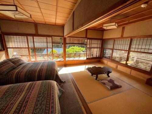 Afbeelding uit fotogalerij van 1st floor 6 tatami floor × 2 + wide edge in Susaki