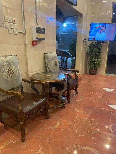 Μια τηλεόραση ή/και κέντρο ψυχαγωγίας στο شقق المربعة للشقق المخدومة