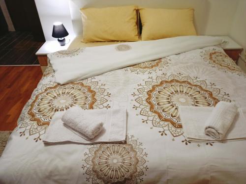 Кровать или кровати в номере Apartman Zvezdica