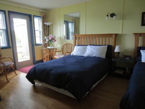 Un pat sau paturi într-o cameră la Hedley House Inn