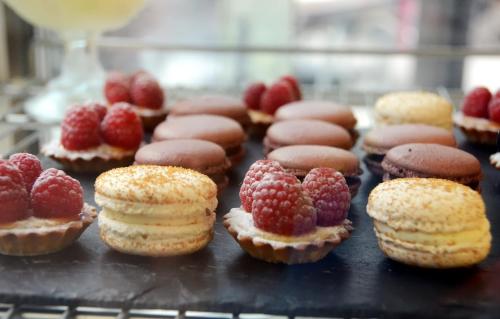 a bunch of pastries with strawberries on a table at Hotel-Restaurant Espace Squash 3000 in Mulhouse