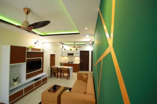 Μια τηλεόραση ή/και κέντρο ψυχαγωγίας στο Green Royale Living Spaces - Luxury Serviced Apartments
