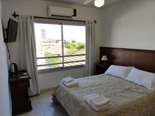 Ένα ή περισσότερα κρεβάτια σε δωμάτιο στο Hosteria Ymaz