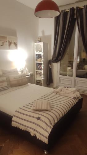 Katil atau katil-katil dalam bilik di Chambre au panier