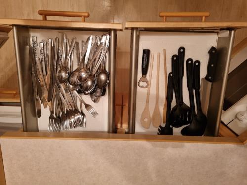 a drawer full of utensils in a kitchen at Alina's DIY-Haus St.Jakob in Innere Großrotte