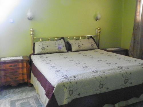 Katil atau katil-katil dalam bilik di Pavillon Des Receptions & Hotel