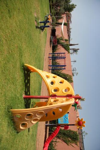 an overhead view of a playground with a yellow object at Palm Plaza Marrakech in Marrakech