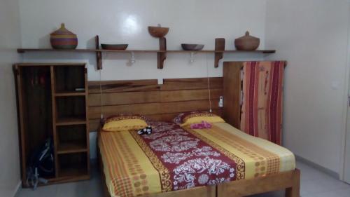 Ένα ή περισσότερα κρεβάτια σε δωμάτιο στο Appartements F2 & F3 à louer Ouest-Foire Dakar