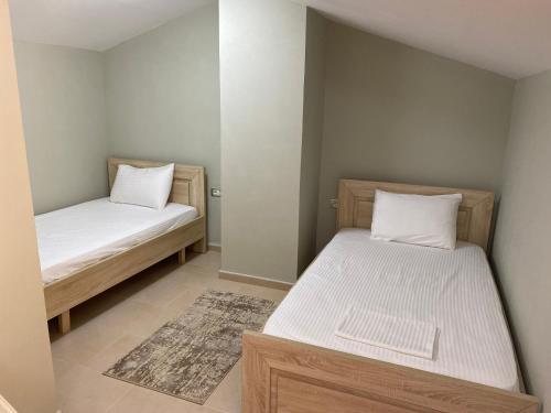 Postel nebo postele na pokoji v ubytování Cozy GuestHome Korce