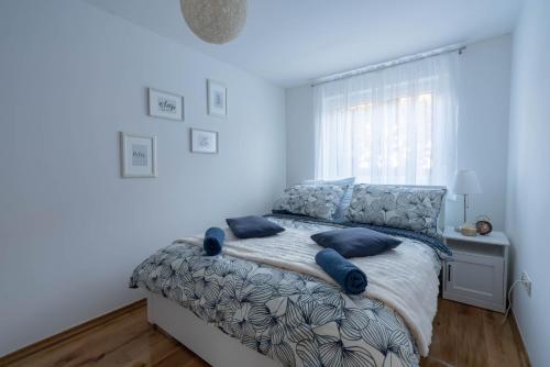 Ένα ή περισσότερα κρεβάτια σε δωμάτιο στο Apartment Gabriella