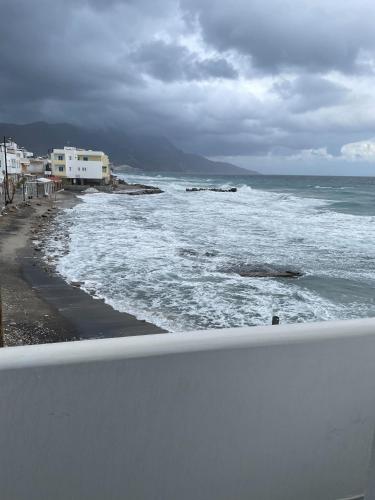 a view of the ocean on a cloudy day at Vrahos in Kardamaina