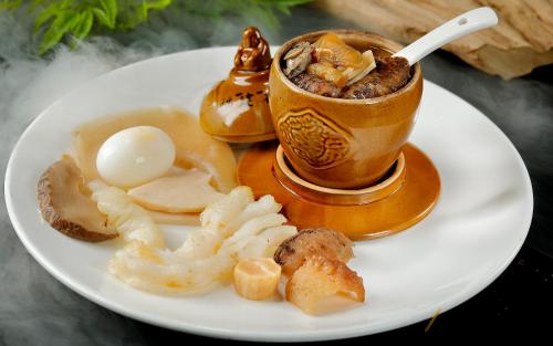 a plate of food with a cup of coffee at City Hotel Xiamen-Free Welcome Fruits in Xiamen