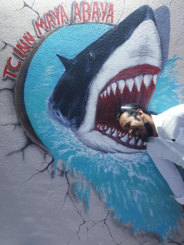 a painting of a shark on the side of a wall at TC Maya Abaya Hotel in Kuantan