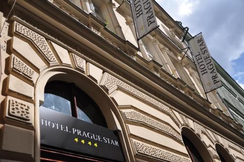 a building with a sign on the side of it at Hotel Prague Star in Prague