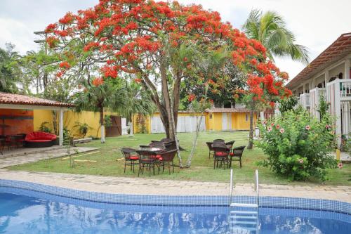 A piscina localizada em Pousada Sunshine Alto Mar ou nos arredores