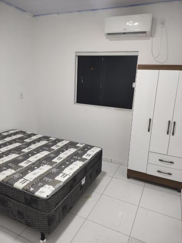 Postel nebo postele na pokoji v ubytování Residencial S A Canasvieiras