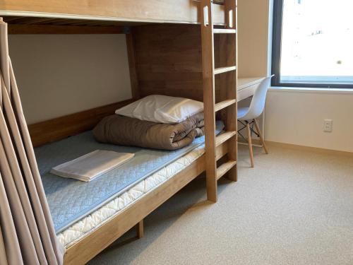 Кровать или кровати в номере Tokyo Ueno Youth Hostel