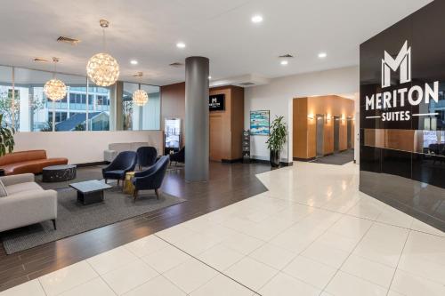 a lobby of a metro station with a waiting room at Meriton Suites Bondi Junction in Sydney