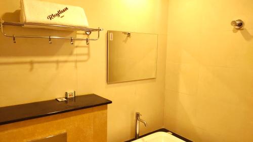 Ванная комната в Hotel Rhythm Grand Suite