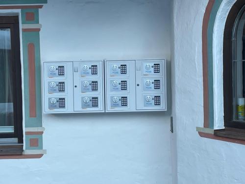 a control panel on the side of a building at W4 Haus Ganghofer in Leutasch