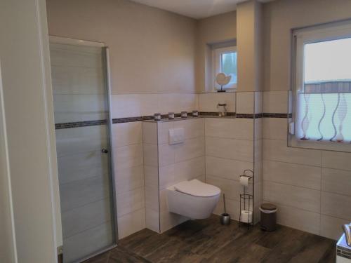Bilik mandi di Ferienwohnung Heimathafen