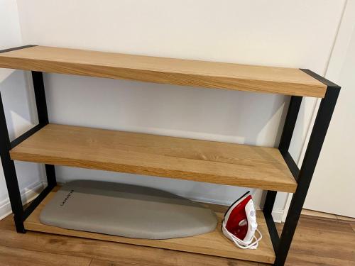 a shelf in a room with a shoe on it at République - Grande la Réal in Perpignan