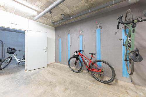 a bike is parked in a room with four bikes at Hostal Trainera in Esterri d'Àneu