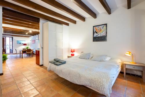 A bed or beds in a room at POC A POC SUITES
